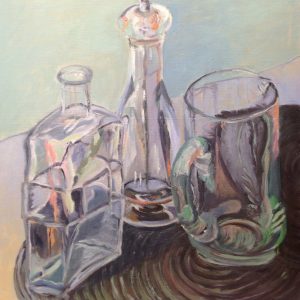 Glass objects on black mat