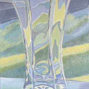 Through vase to green garden